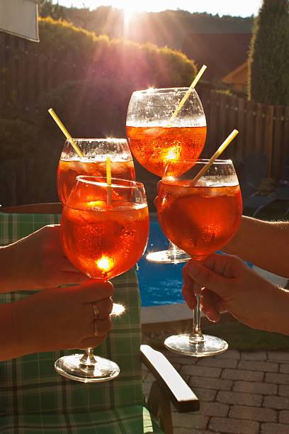Cold summer drink by the pool. Alcohol drink with ice
