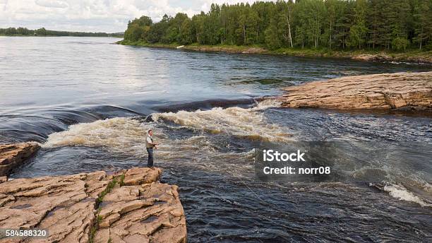 Fishing In Scandinavia Stock Photo - Download Image Now - Adult, Backgrounds, Blue