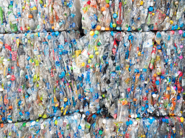 istock out of focus large stack of old plastic bottles 584590076