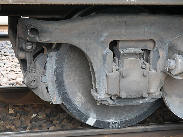 istock Industrial rail car wheels closeup photo 584590926