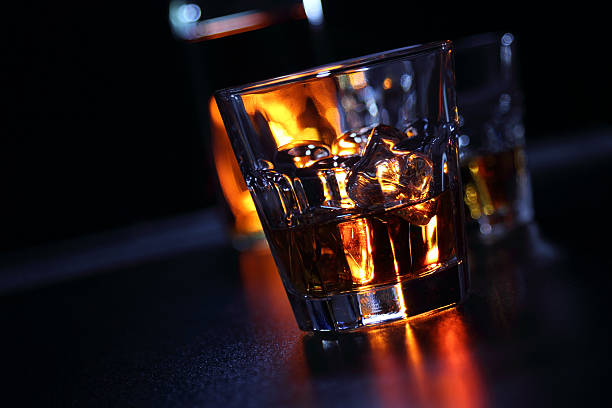istock Glasses of whiskey on the bar 584593838