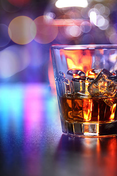 istock Glass of whiskey on the bar 584593912