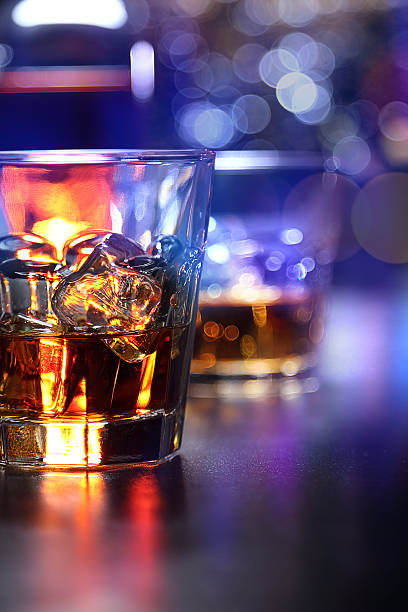istock Glasses of whiskey on the bar 584593954