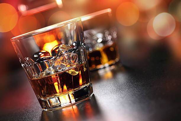 istock Glasses of whiskey on the bar 584594036