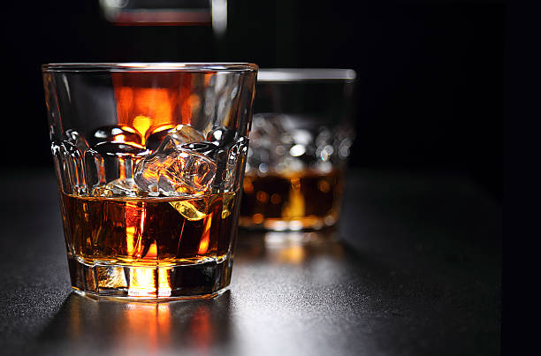 istock Glasses of whiskey on the bar 584594074