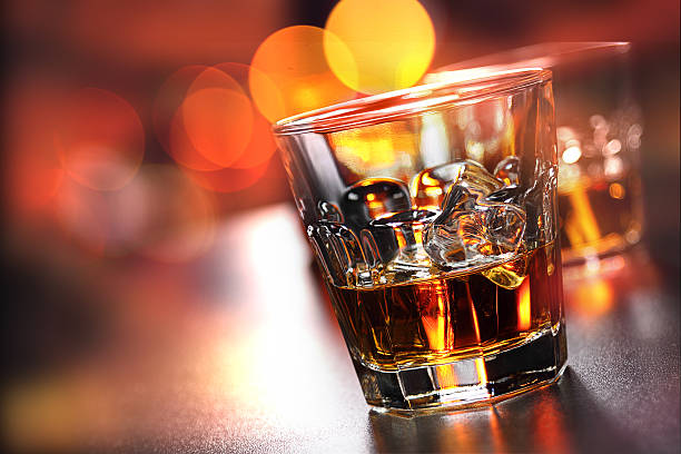 istock Glasses of whiskey on the bar 584594168