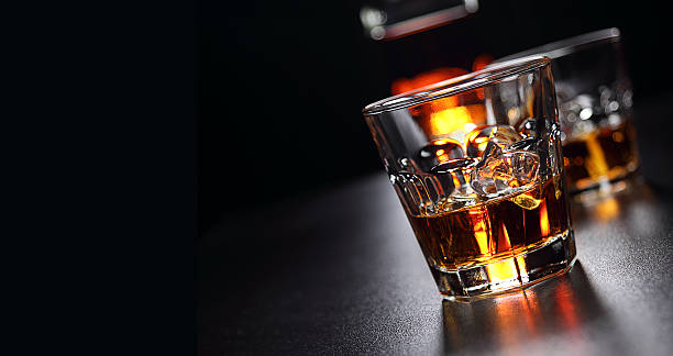 istock Glasses of whiskey on the bar 584594208