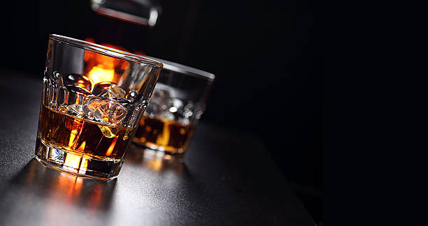 istock Glasses of whiskey on the bar 584594234