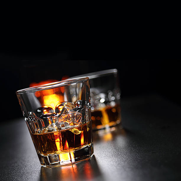 istock Glasses of whiskey on the bar 584594278