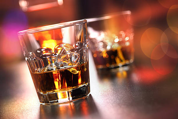 istock Glasses of whiskey on the bar 584594308