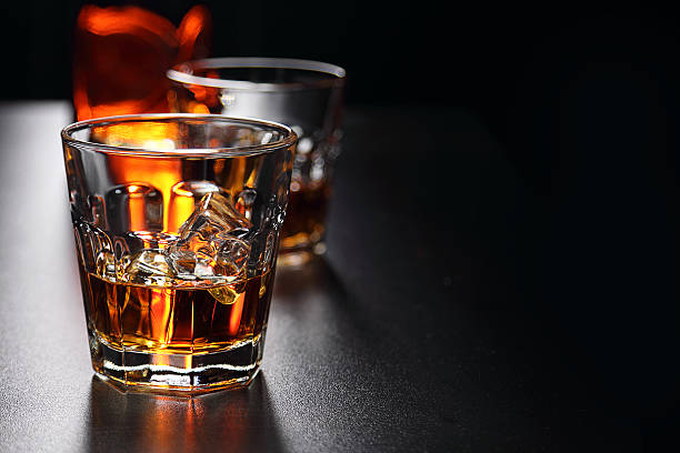 istock Glasses of whiskey on the bar 584594346