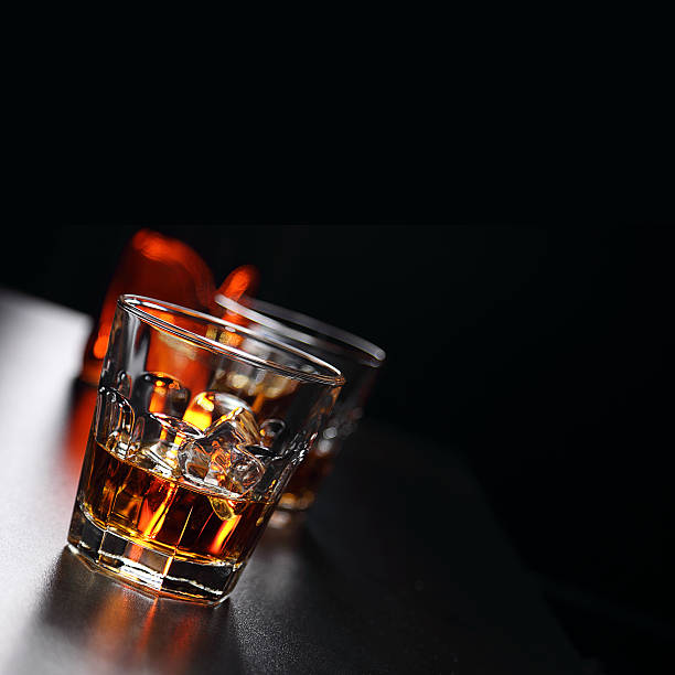 istock Glasses of whiskey on the bar 584594388
