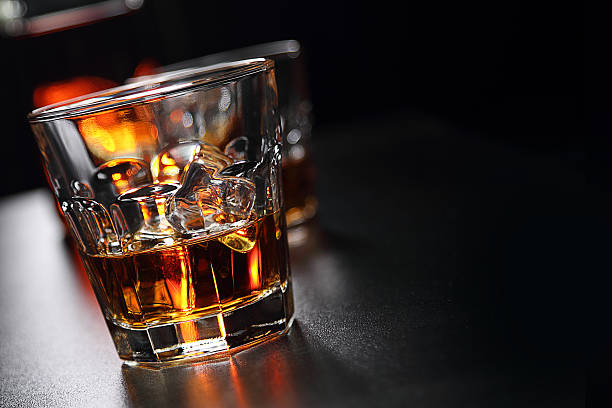 istock Glasses of whiskey on the bar 584594492