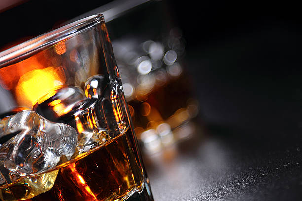 istock Glasses of whiskey on the bar 584594620