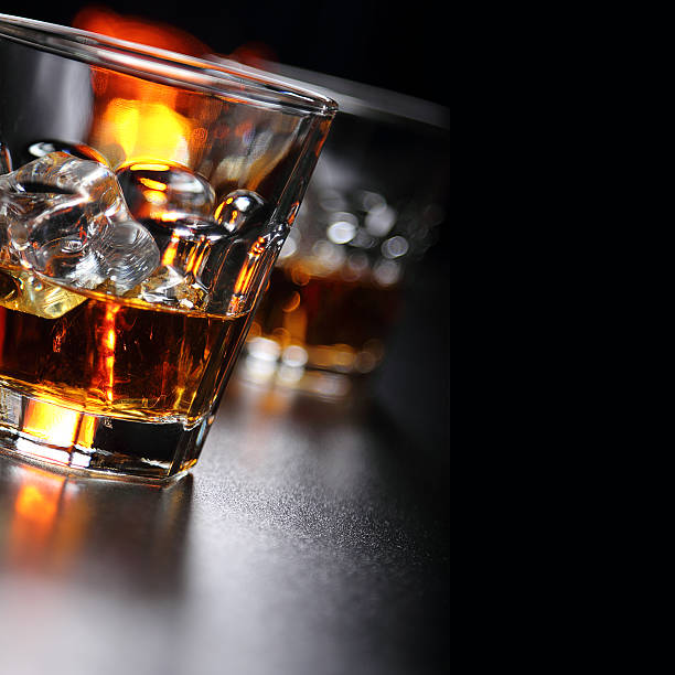 istock Glasses of whiskey on the bar 584594676