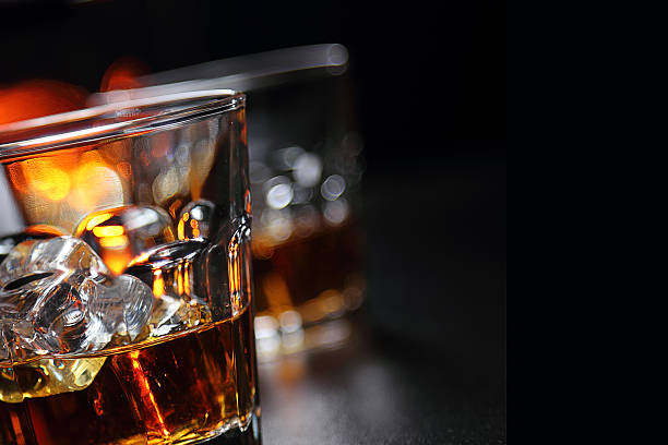 istock Glasses of whiskey on the bar 584594812