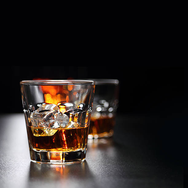 istock Glasses of whiskey on the bar 584594862
