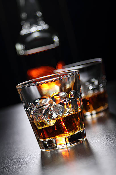 istock Glasses of whiskey on the bar 584594924