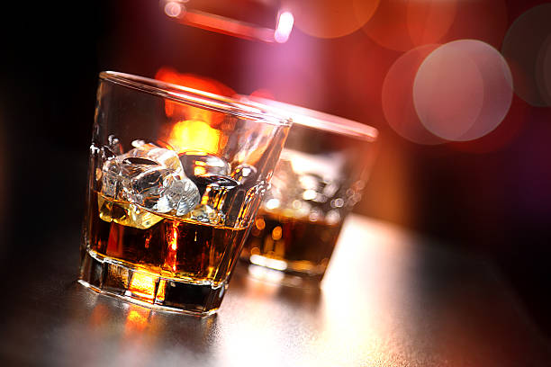 istock Glasses of whiskey on the bar 584595114