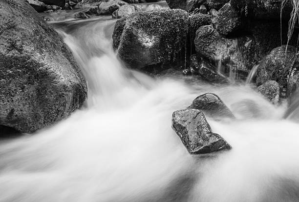 istock Mountain river long exposure black and white landscape. 584598396