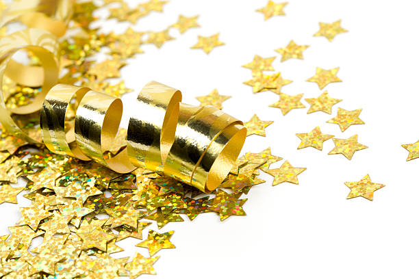 istock golden ribbon and confetti stars 584598830