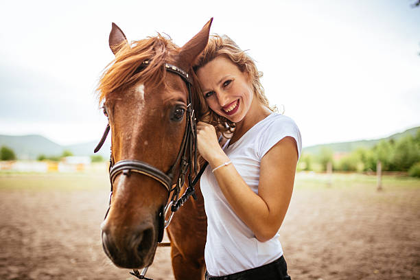 istock Girl loves her hores 584600464