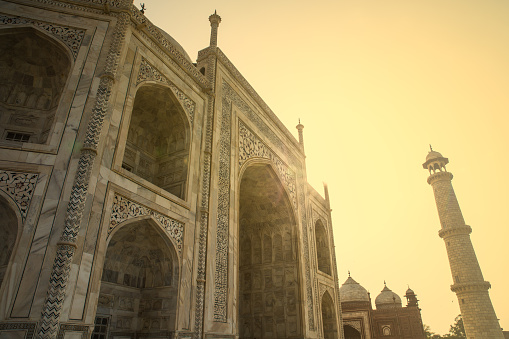 A glimpse at the top portion of the magnificent Taj Mahal, situated in the city of Agra, on a sunny Spring day.