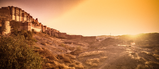 At sunset, a view of Mehrangarh Fort in Jodhpur, India also known as the Blue City.