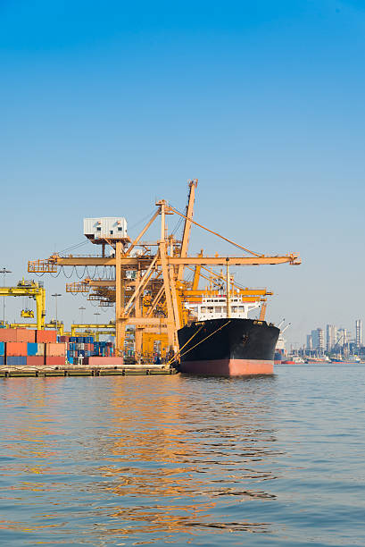 istock Industrial port and Container ship logistic the harbor in Asia , 584611206