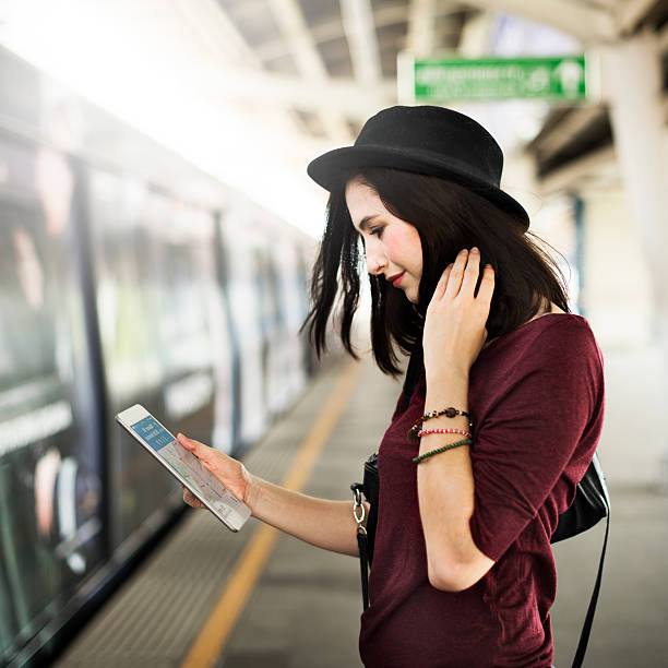 istock Woman Digital Tablet Trip Transportation Traveling Concept 584611360