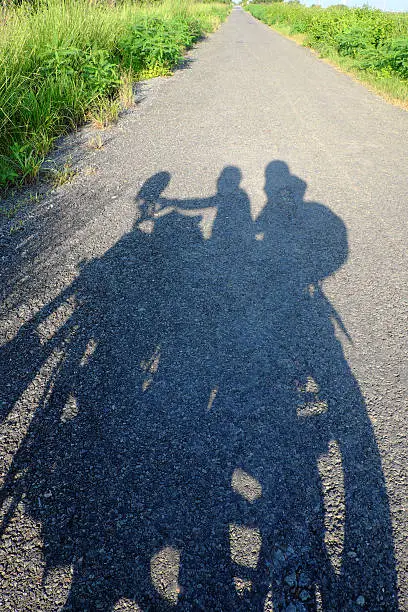 Photo of backpacker couple travel by motorbike