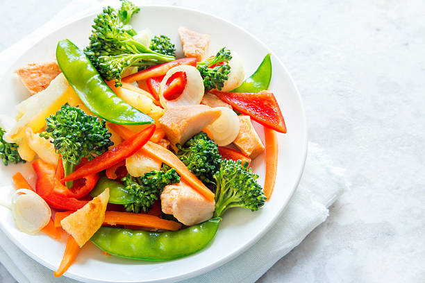 istock stir fry with chicken 584748492