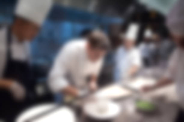 istock Blurry of Chef in hotel or restaurant kitchen 584748740