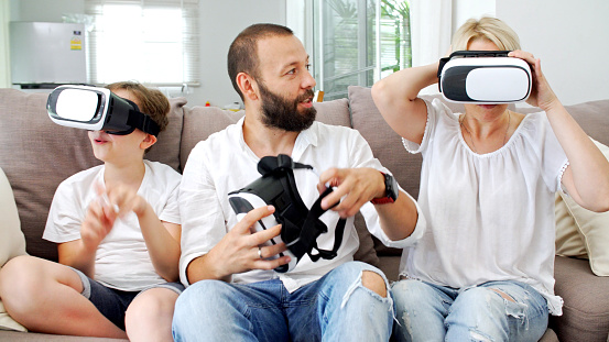 Family at home using VR headset. Creative Content Brief 603438805