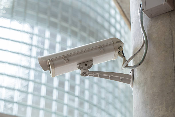 istock Security camera or CCTV in weather sealed holder. 584752512