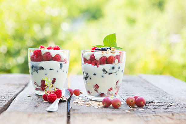 istock Natural yogurt with fresh raspberries, black currant and muesli. 584752708