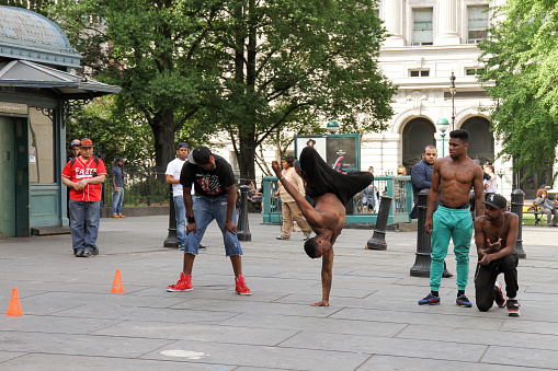 Manhattan, New York, USA -  May 29, 2015: Black people b-boys performing breaking dance in a square near City Hall Park in Lower Manhattan