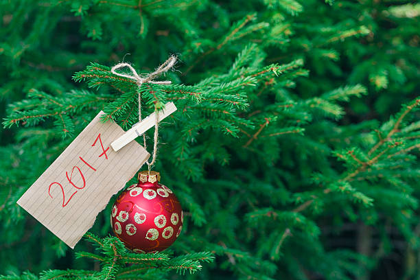 istock closeup big red balls on the fur-tree 584755654