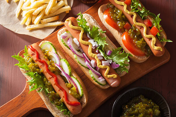 istock grilled hot dogs with vegetables ketchup mustard 584757330