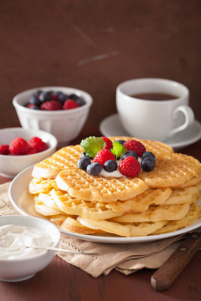istock waffles with creme fraiche and berries for breakfast 584758026
