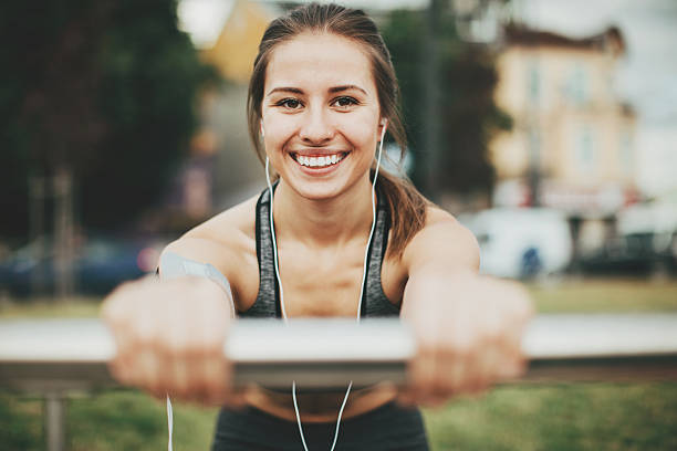 istock Sportswoman exercising outdoors 584758188
