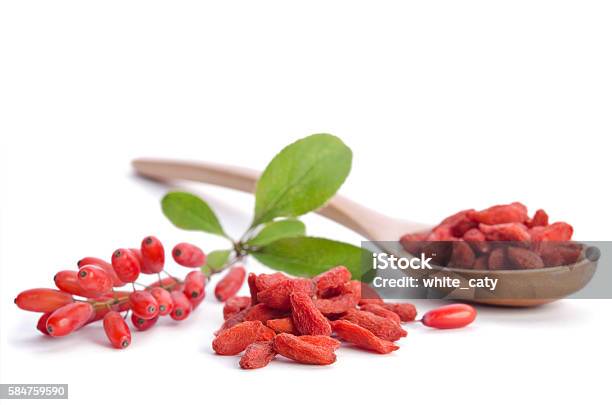 Barberries And Goji Berries Isolated On White Background Stock Photo - Download Image Now