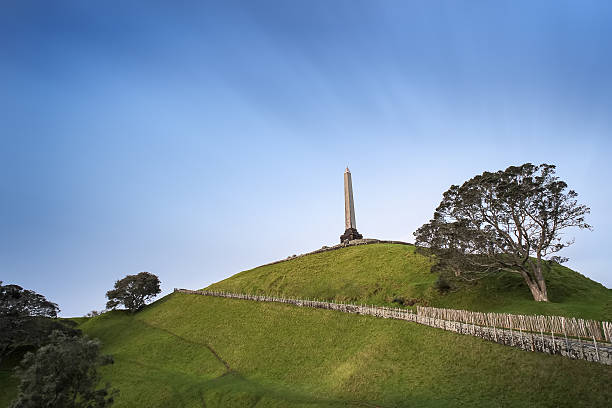 One Tree Hill Park in Auckland, New Zealand One Tree Hill is a 182-metre (597 ft) volcanic peak in Auckland, New Zealand, Selective Focus treaty stock pictures, royalty-free photos & images
