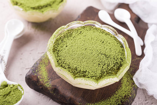 istock Tiramisu cake with green matcha tea 584761770