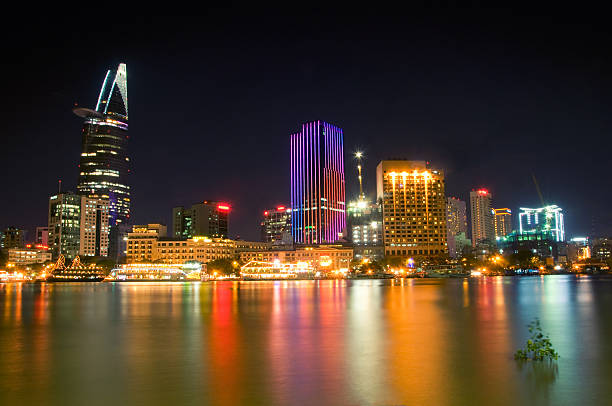 istock Downtown Saigon by night - biggest city in Vietnam. 584762818