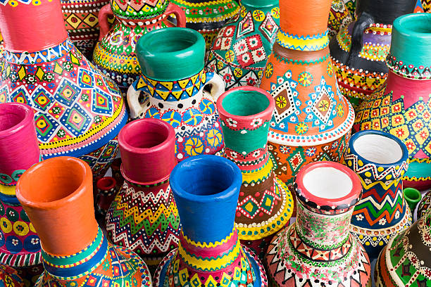 istock Composition of artistic painted handcrafted pottery vases 584764742