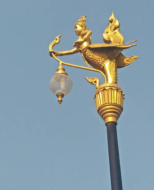 istock street lamp post in blue sky background 584764790