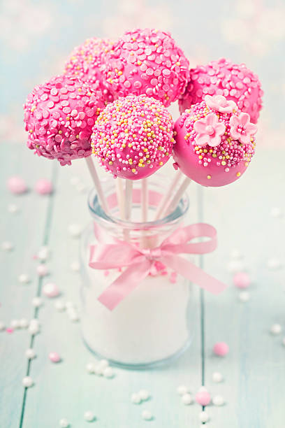 pink cake pops in a vase - flavored ice variation birthday candy imagens e fotografias de stock