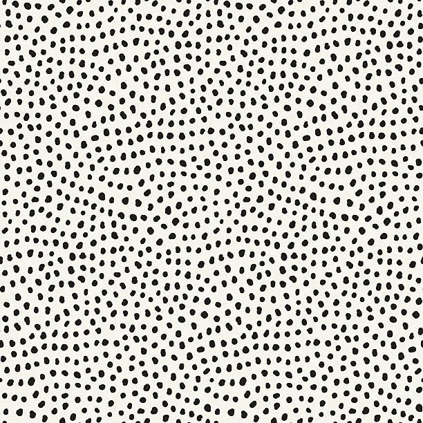 Vector illustration of Hand drawn black dots on white background