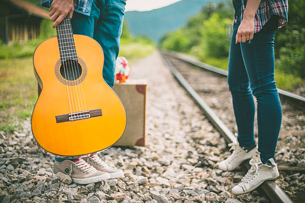 istock Cute couple on the railroad 584767044